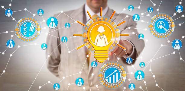 istock Male HR Manager Selecting Bright Female Employee 905580294