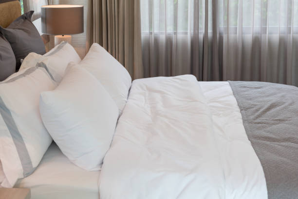 istock classic bedroom style with set of pillows 905580514