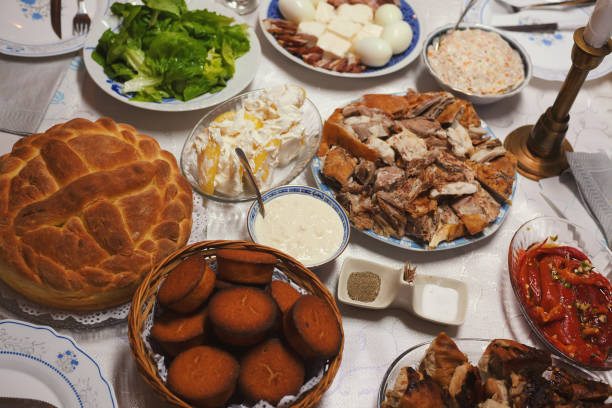A lot of celebrity food on the table, a celebration called Slava in Serbia.