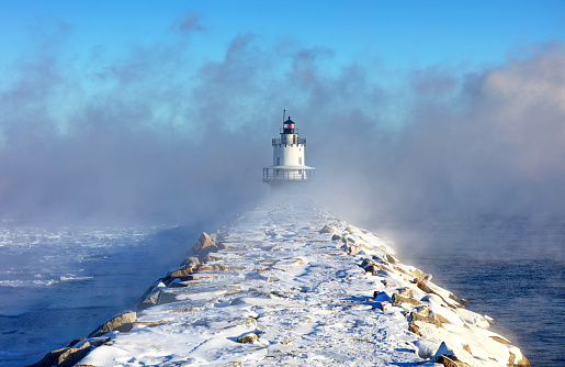 Spring Point Ledge Light is a sparkplug lighthouse in South Portland, Maine that marks a dangerous obstruction on the west side of the main shipping channel into Portland Harbor. The U. S. Coast Guard retains responsibility for maintenance of the light and electronic fog signal as an active aid to navigation.