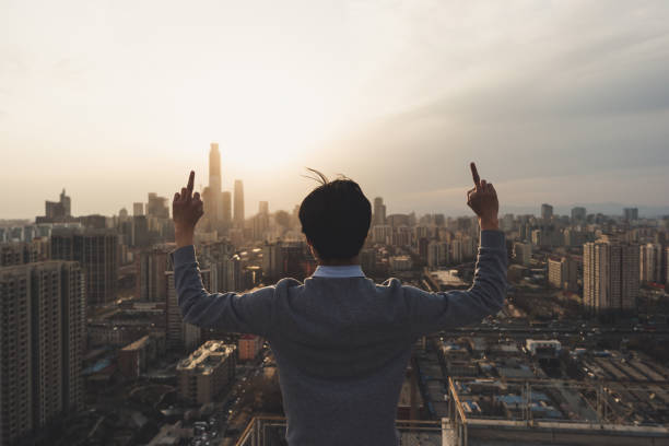istock Man on Roof giving obscene finger gesture 905588162