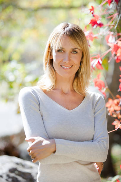 istock happy woman in automn 905588184
