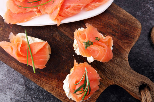 istock Bread with smoked salmon and cream cheese and herbs 905598466