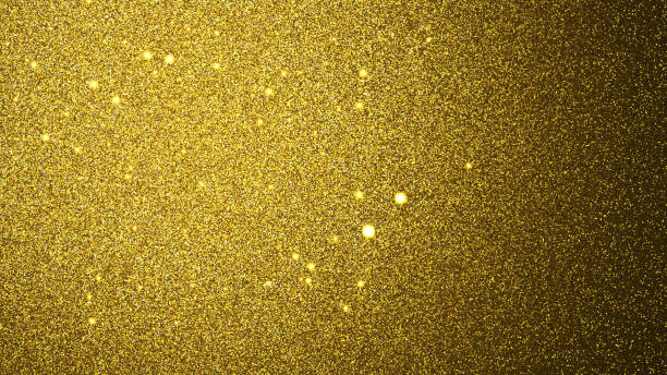 gradiente purpurina dourada - cintilação glitter ouro em uma superfície plana, iluminada por uma luz brilhante - gold bright brightly lit light - fotografias e filmes do acervo