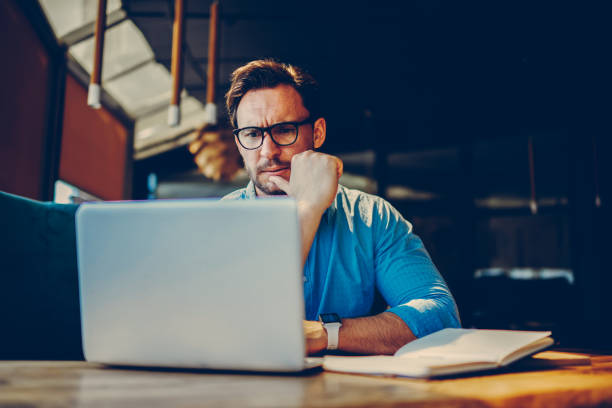 istock Depressed male entrepreneur feeling headache can't solve problems with finance checking report on netbook.Stressed manager worried about documentation on laptop failure with saving on software 905599932