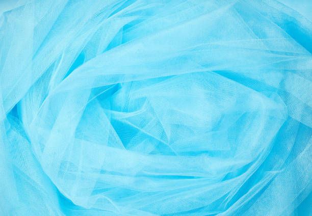 istock blue organza fabric wavy texture 905600516
