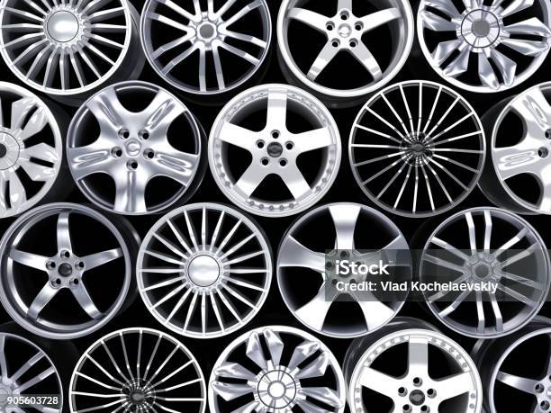 Many Car Disc On Black Background Stock Photo - Download Image Now - Alloy Wheel, Alloy, Spare Part