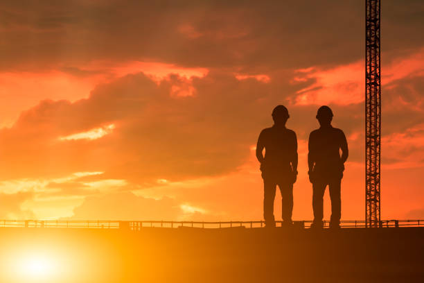 istock Engineers are consulting before ordering construction work on site. Construction teams are working in heavy industries, ground and safety concepts. 905604386