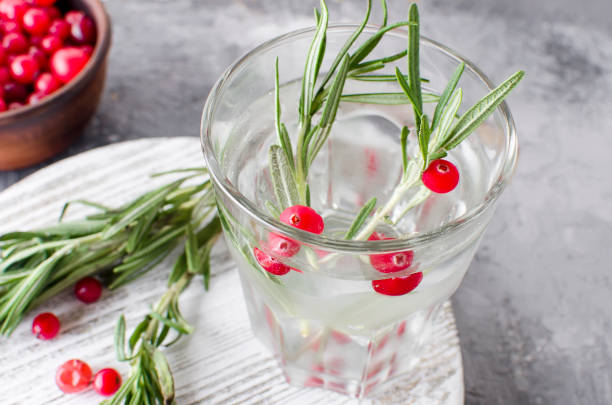 istock cocktail with cranberry, rosemary and ice 905608278