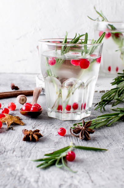 istock cocktail with cranberry, rosemary and ice 905608972