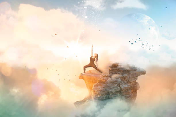 Woman doing yoga on cliff with clouds birds and moon