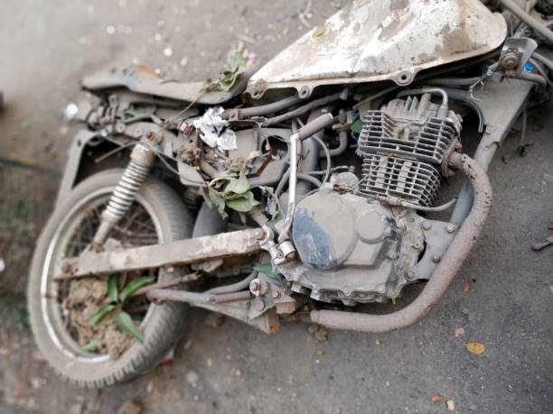 Rusted old motorcycle on the ground