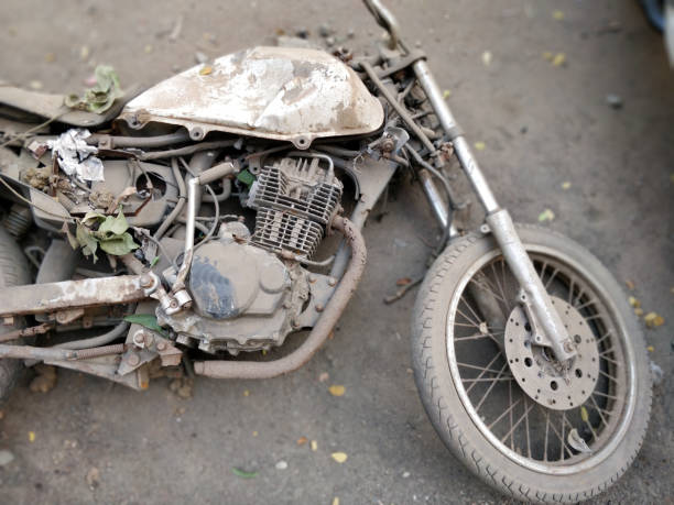 istock Rusted old motorcycle on the ground 905609486