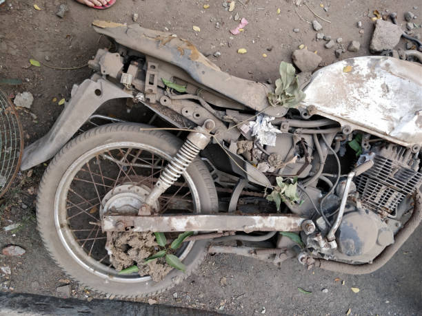 istock Rusted old motorcycle on the ground 905609496