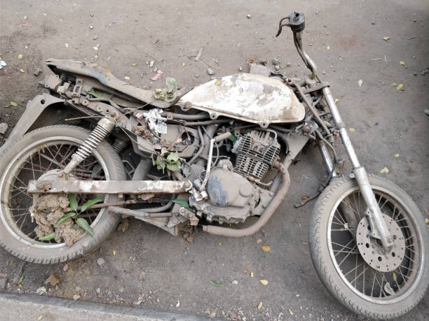 istock Rusted old motorcycle on the ground 905609498