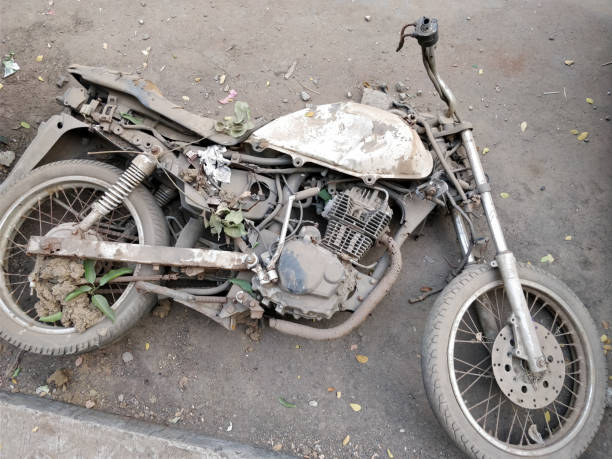 istock Rusted old motorcycle on the ground 905609518