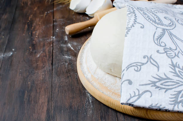 istock Ball dough , flour in a ceramik bowl 905613536