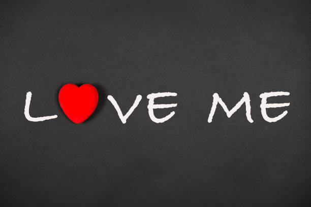 istock Love me phrase with a shape of heart 905616748