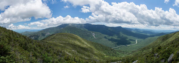 Cannon Mountain Panoramic Panoramic View from Cannon Mountain in Franconia Notch State Park, New Hampshire, USA - showing Interstate 93 in the distance white mountains new hampshire stock pictures, royalty-free photos & images