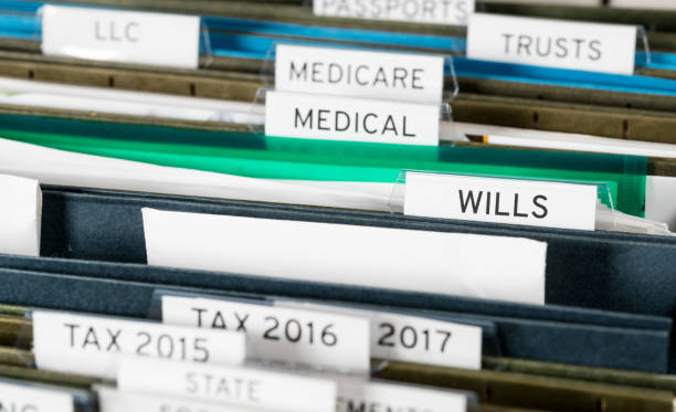 istock Home filing system organized in folders for wills 905627132