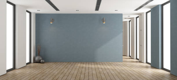 Empty minimalist interior Empty minimalist room with blue wall ,glass door and windows - 3d rendering
 unfurnished stock pictures, royalty-free photos & images