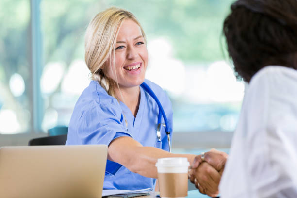 istock Medical professional greet one another before meeting 905637000