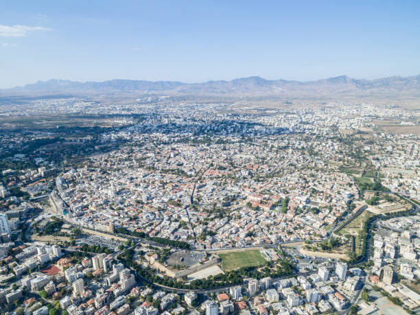 High altitude aerial view of the old city of Nicosia enclosed within the Venetian walls View of the last divided capital of Europe, in the background the Kyrenia mountains can be seen. nicosia cyprus stock pictures, royalty-free photos & images