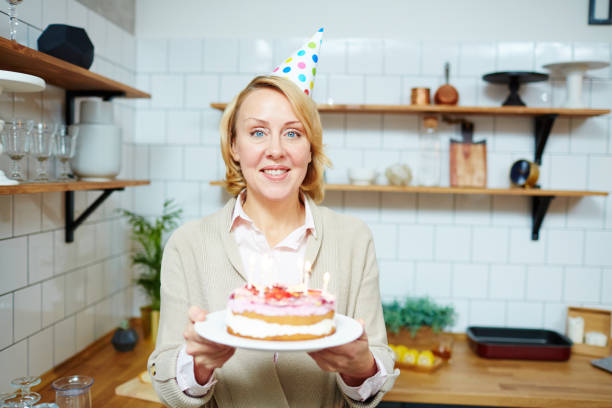 istock Woman celebrating birthday 905647220