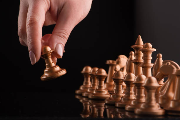 istock Start of the game with gold chess 905647544
