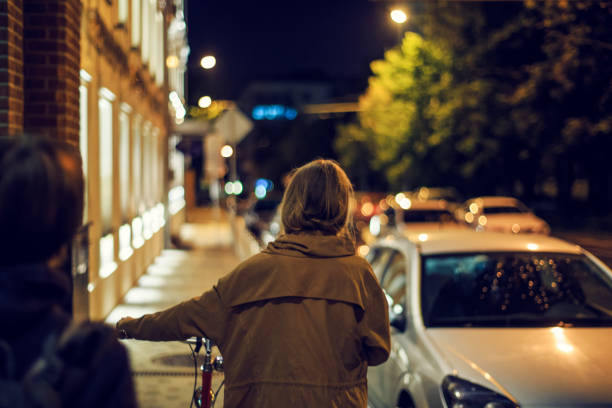 istock Walking break in night city cycling 905660458