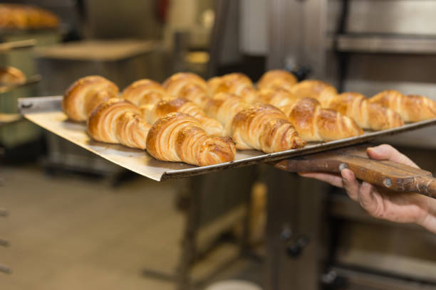 istock baking pastries and bread in an oven at a bakery 905663980