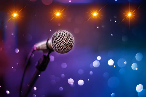 istock communication microphone on stage against a background of auditorium Concert stage 905666898