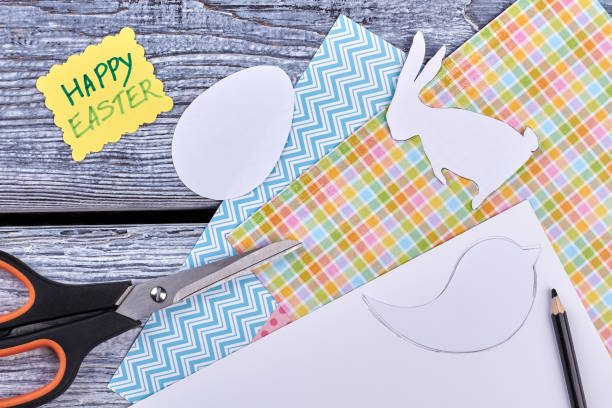 istock Papercut items and Easter greeting card. 905666922
