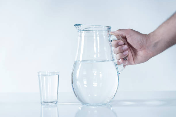 istock the man is filling water cup.DRİNK WATER. 905668564