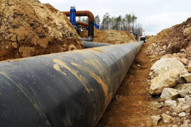 New Oil pipeline under busy construction site