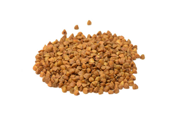 istock bunch of buckwheat groats on a white background 905671130