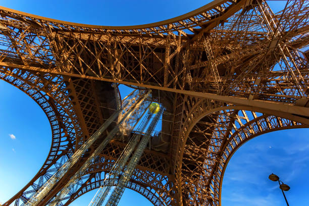istock Gorgeous view of Eiffel Tower with dramatic sky 905671494
