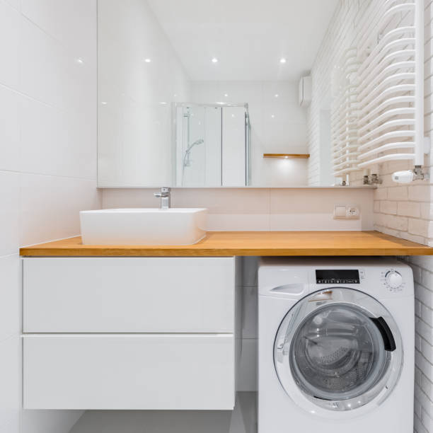 istock White bathroom with countertop basin 905671558