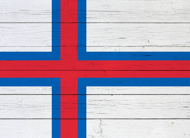 istock Flag on wooden background 905678110