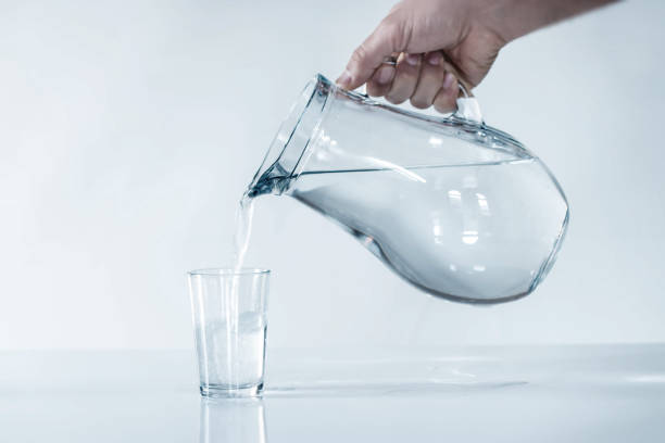 istock the man is filling water cup.DRİNK WATER. 905678484