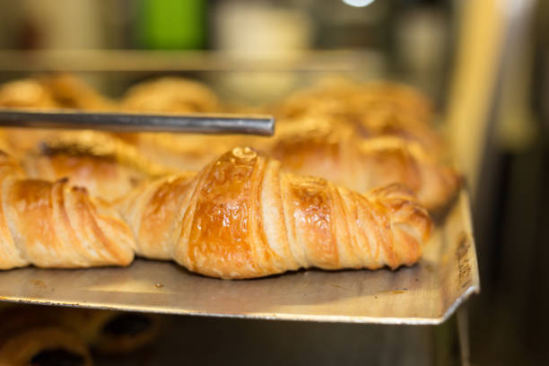 istock baking pastries and bread in an oven at a bakery 905682224