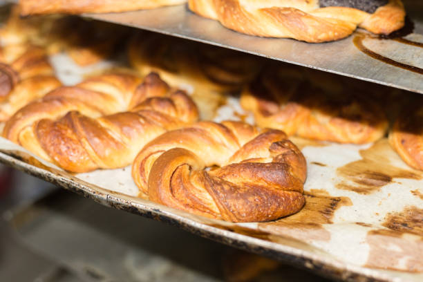 istock baking pastries and bread in an oven at a bakery 905682230