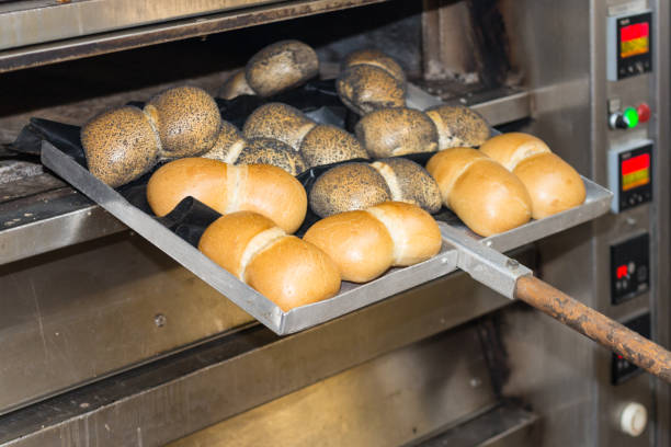 istock baking pastries and bread in an oven at a bakery 905682260