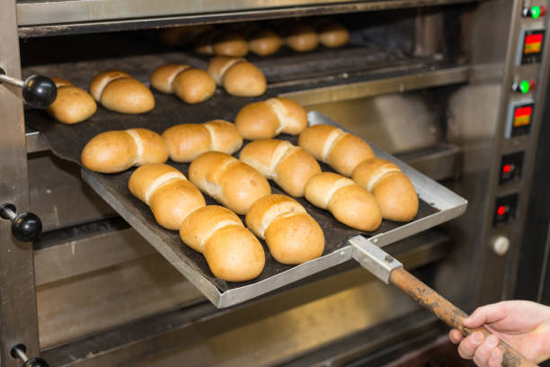 istock baking pastries and bread in an oven at a bakery 905682276