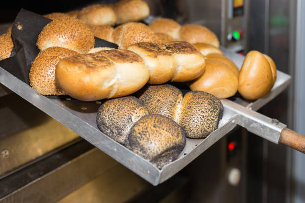 istock baking pastries and bread in an oven at a bakery 905682294