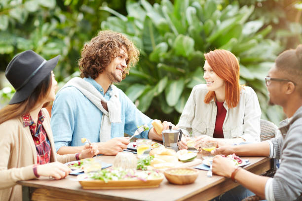istock Dinner of friends 905682762