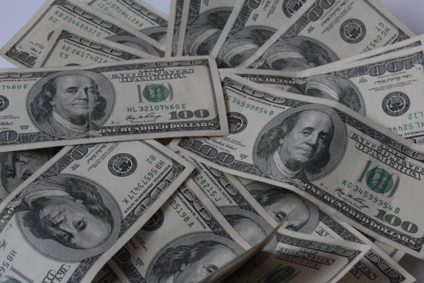 istock dollar bills one hundred dollars 905684284