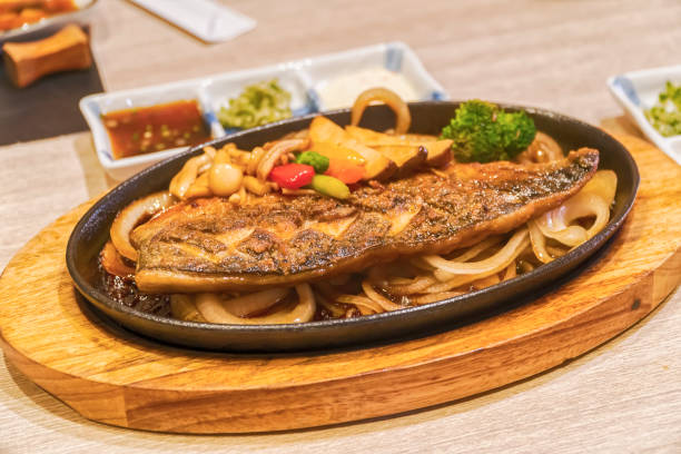 istock Close up of Saba fish grilled in restaurant.Selective focus 905686418