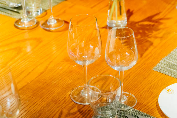 istock Close up picture of empty glasses in restaurant 905686464