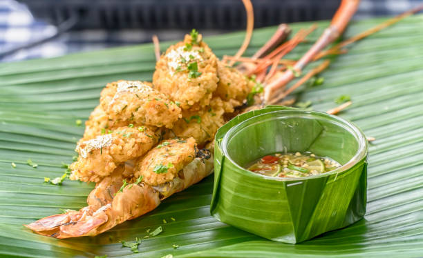 istock Fried rice with shrimp and sauce and paste gold leaf 905686536